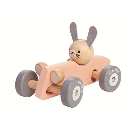 PlanToys rabbit in pink racing car