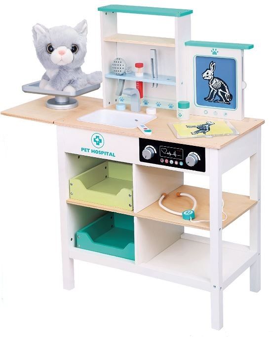Play veterinary practice with plush toy
