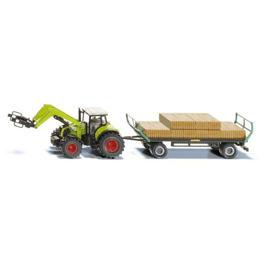 Siku tractor and bale wagon