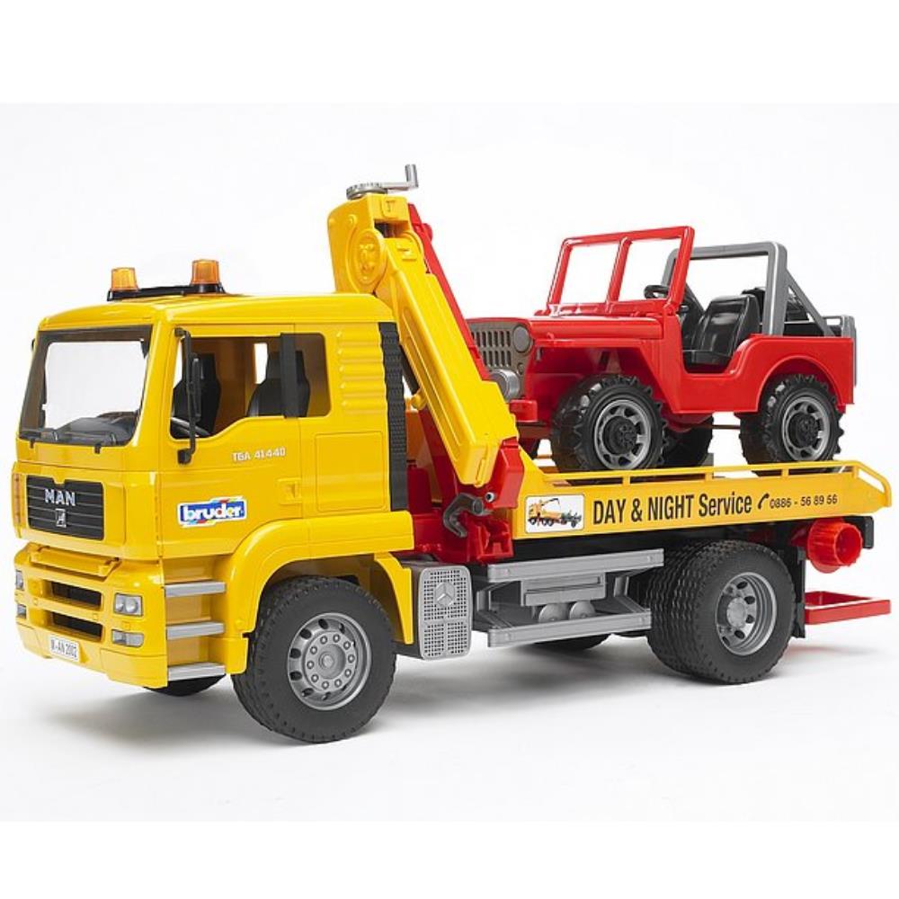 Bruder MAN TGA tow truck with off-road vehicle