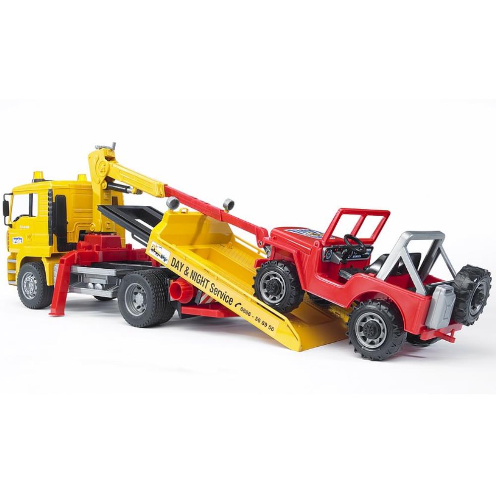 Bruder MAN TGA tow truck with off-road vehicle