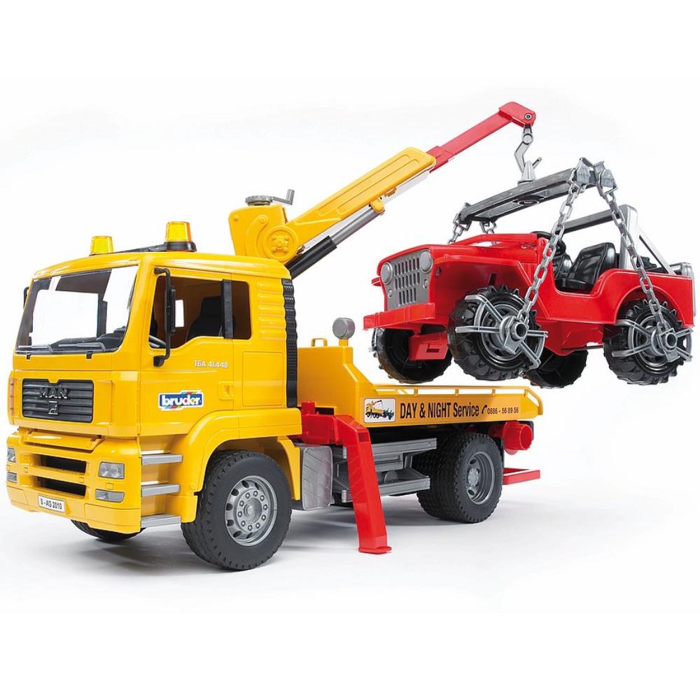 Bruder MAN TGA tow truck with off-road vehicle